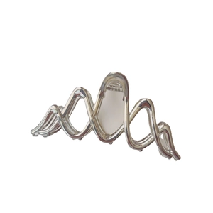 Elegant silver alloy shark hair claw clip with a wavy design and sturdy metal spring