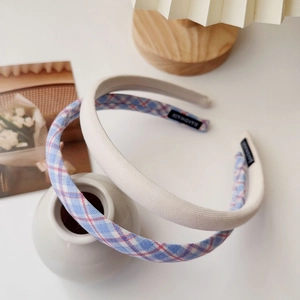 Two-piece plaid and cream fabric headbands set for elegant hair styling and volume