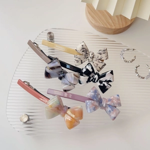 Elegant set of 5 cream acetate bow hair clips in tortoiseshell and marble textures