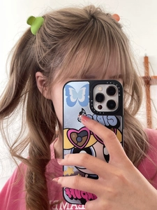 Detail view of mirror phone case with Bubbles character and blue butterflies design