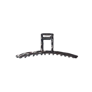 Large metal hair claw clip in gunmetal grey with wave texture for bun hairstyles