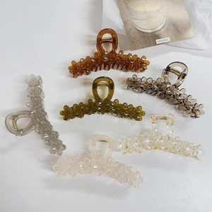 Set of six large jelly-colored floral hair claws in matte resin for elegant hair styling