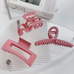 Ensemble de trois pinces à cheveux roses brillantes avec designs évidé et ondulé