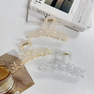 Three-piece set of jelly color flower shark clips in pink, amber, and transparent finish