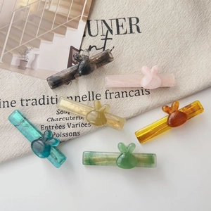 Lot de six barrettes lapin colorées texture marbrée sur fond de lin rustique chic