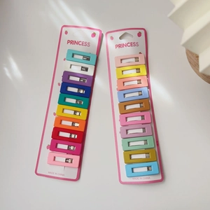 Detailed macro view of 10-piece colorful geometric rectangle hair clips for girls