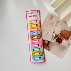 Detail view of 10 pieces macaron color rectangle hair clips on princess backing card
