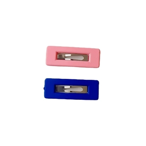 Set of two rectangular matte geometric hair clips in pink and navy blue for girls