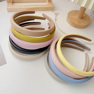 Minimalist wide PU leather headbands in multiple solid colors with anti-slip velvet lining