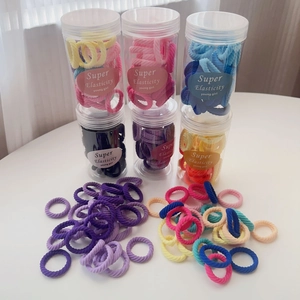 Multi-colored high elasticity hair ties set in a transparent jar for girls