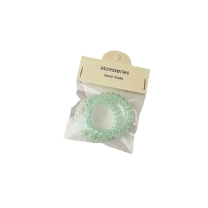 Lot de 2 élastiques spirale vert clair transparents avec carte de présentation