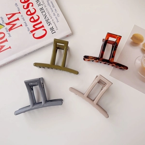Minimalist rectangular acrylic hair claws in four colors for elegant hair styling
