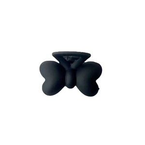 Pince à cheveux papillon noir mat pour coiffures de princesse et maintien latéral élégant