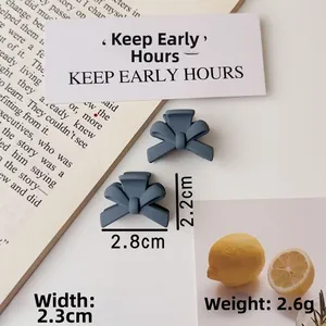 Close-up of matte Morandi blue bow hair clips with 2.8cm width and 2.2cm height detail
