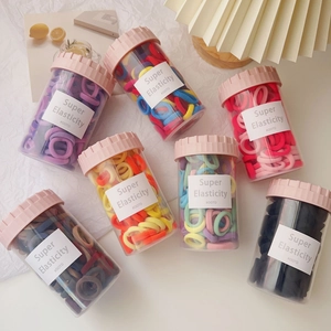 Bulk set of candy color elastic hair bands for girls in transparent storage jars