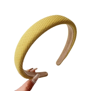 High-volume ginger yellow padded headband with a textured waffle-knit pattern fabric