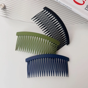 Three-piece matte hair comb set in black, green, and navy for styling stray hairs