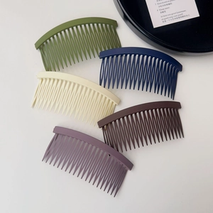 Five-piece set of matte curved hair side combs for styling in assorted earthy tones