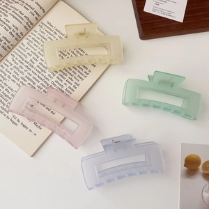 Matte finish large shark hair clips in pastel colors for thick hair styling