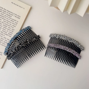 Close-up of colorful rhinestone hair side combs with black resin base in four vibrant colors