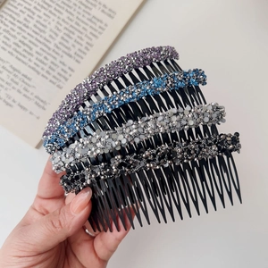 Set of four colorful rhinestone hair combs in purple blue silver and black for women