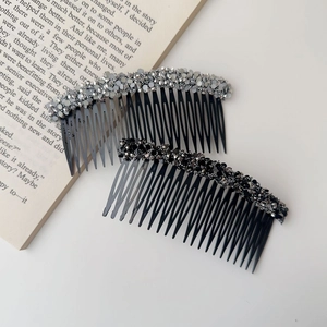 Detail of two-piece beaded hair side combs with black rhinestones for hair styling