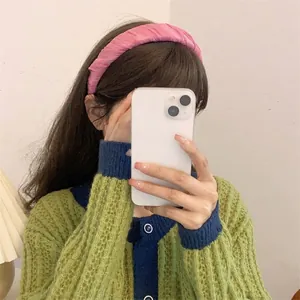 Pink pleated wide headband with thick fabric texture for high cranial top hairstyle