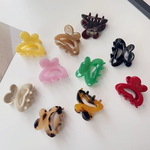 Colorful butterfly hair claws in ten different shades with glossy resin finish for women