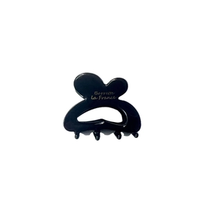 Black butterfly hair claw clip with golden Barrette La France text and four teeth