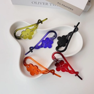 Five-piece set of banana clips with floral resin design in assorted colors for hair
