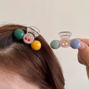Retro color-block cherry hair claws with colorful spheres and polished resin finish
