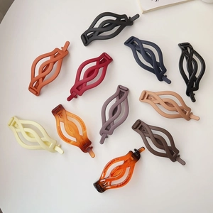 Set of matte finish twist hair clips in various colors for women's elegant hairstyles