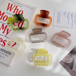 Set of six colorful rectangular matte hair claws in soft pastel jelly tones for styling