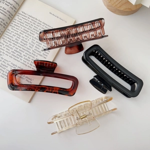 Set of four large acrylic hair claws in tortoiseshell, black, champagne and dark brown colors