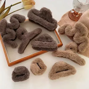 Large plush claw clips and hairpins in coffee and beige colors for autumn styling