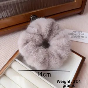 Detail of 14cm plush faux mink fur scrunchie showing the soft texture and large size