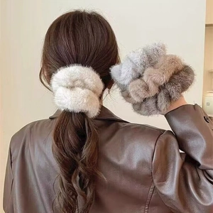 Plush faux mink fur hair scrunchies in neutral colors for elegant autumn winter hairstyles