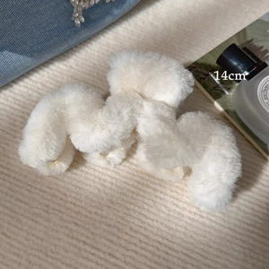 Detail view of a 14cm large white plush shark clip with soft faux fur and wave design