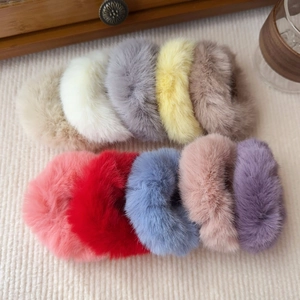 Flat lay of 10-piece colorful plush hair scrunchies set with soft faux fur texture