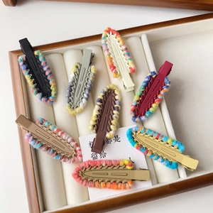 Knitted wool edge contrast color hair clips set in a wooden jewelry box display