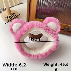 Pink plush bear headband for face washing with soft faux fur texture and cute ears