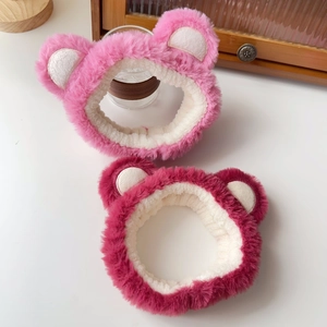 Detail view showing soft plush texture and cute bear ears on these spa headbands