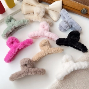 Elegant plush faux fur hair claw clips for women in nine diverse warm autumn winter colors