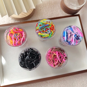 Five jars of colorful high-elastic hair ties set for girls in neat storage packaging