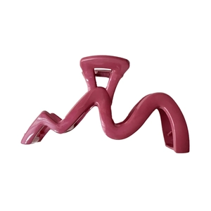 Pink wave hair claw clip for women made of polished PC resin with a durable metal spring