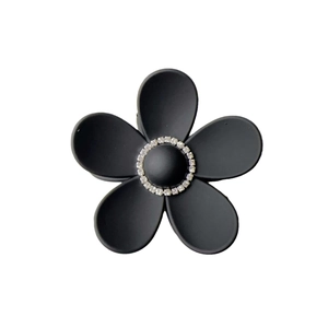 Matte black flower hair claw clip with sparkling rhinestones and leopard print texture