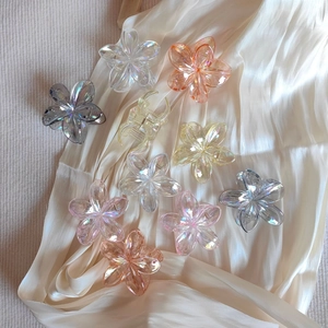 Set of 9 iridescent flower hair claws with gradient aurora resin finish on soft fabric