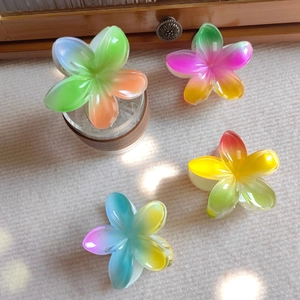 Set of four gradient plumeria flower hair clips with high-quality resin finish