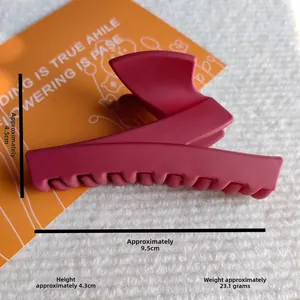 Macro view of matte rose red hair claw clip with detailed size dimensions in centimeters