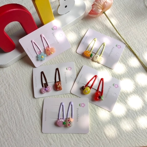 Close-up of 10pcs set cute cartoon resin hair clips with bunny and flower motifs